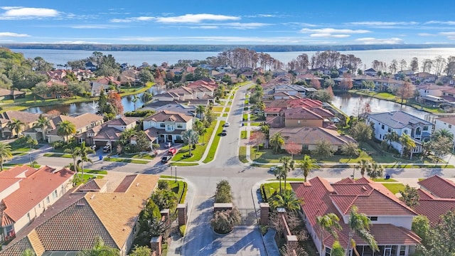 drone / aerial view with a water view