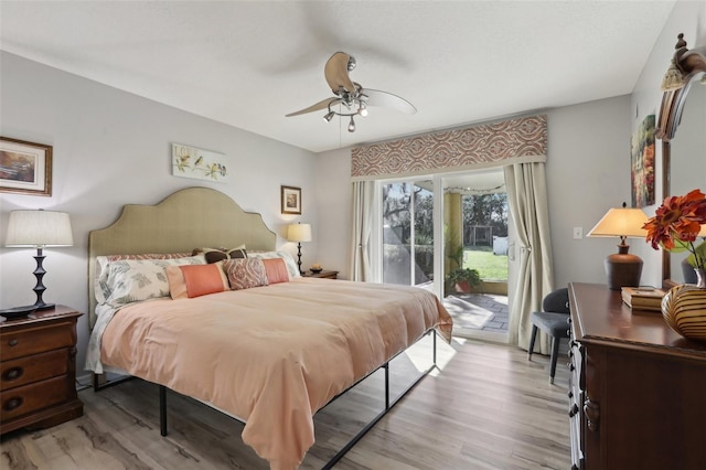 bedroom featuring ceiling fan, access to exterior, and light wood-type flooring