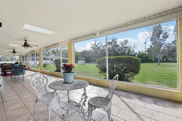 sunroom featuring a skylight