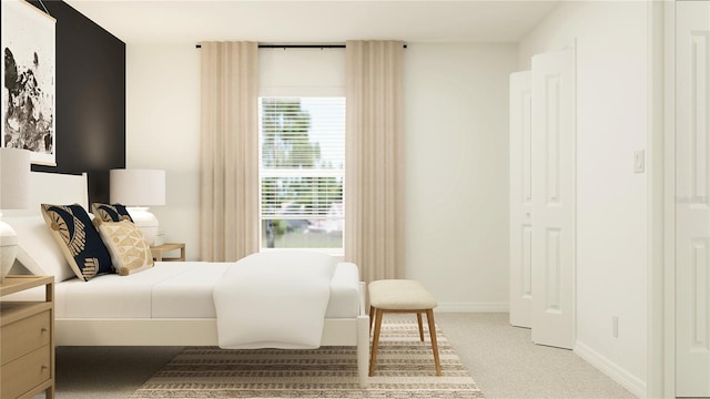 bedroom featuring light colored carpet