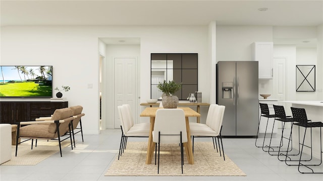 dining room with light tile patterned flooring