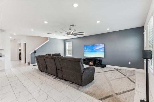 living room featuring ceiling fan