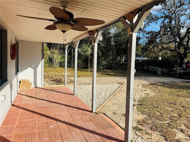 view of patio featuring ceiling fan