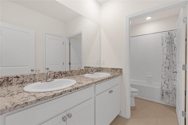 full bathroom with vanity, shower / tub combo, tile patterned floors, and toilet