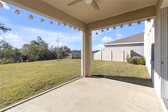 view of patio featuring ceiling fan