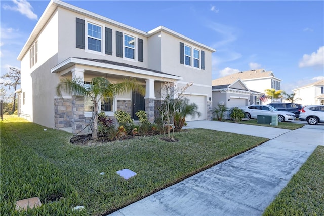 view of front of property featuring a garage and a front yard