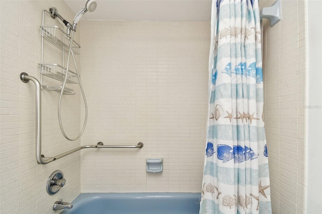 bathroom with shower / bath combo