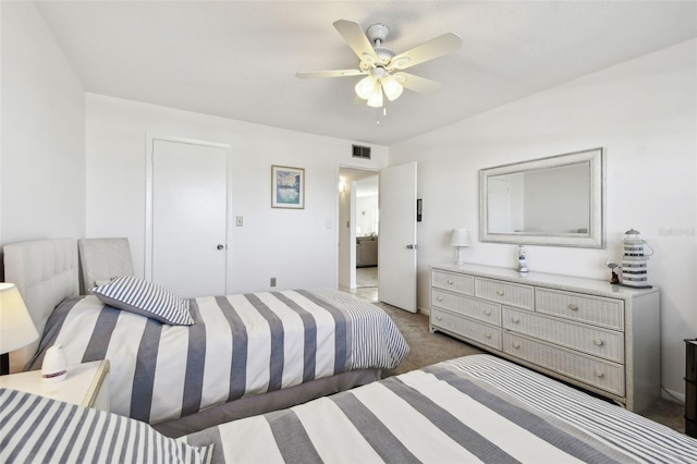 carpeted bedroom with ceiling fan