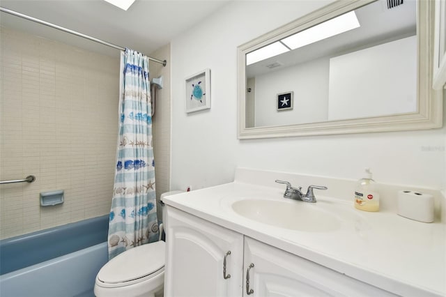 full bathroom featuring shower / bathtub combination with curtain, vanity, and toilet