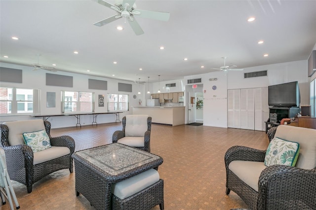 living room featuring ceiling fan