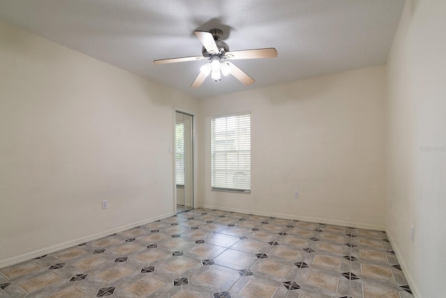 empty room with ceiling fan