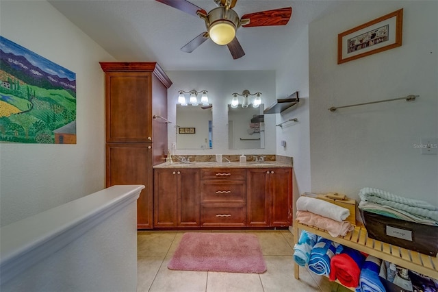 bathroom with ceiling fan, vanity, and tile patterned flooring