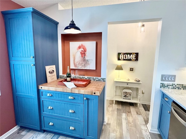 bathroom with vanity, backsplash, and hardwood / wood-style flooring