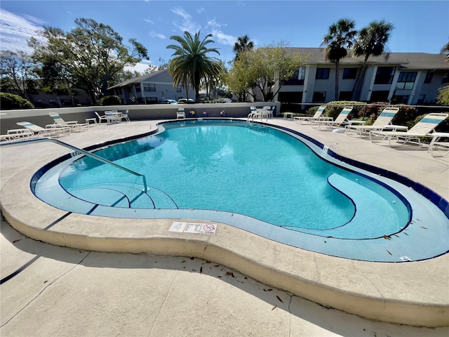 view of swimming pool featuring a patio