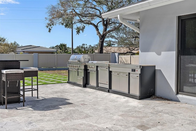 view of patio with area for grilling