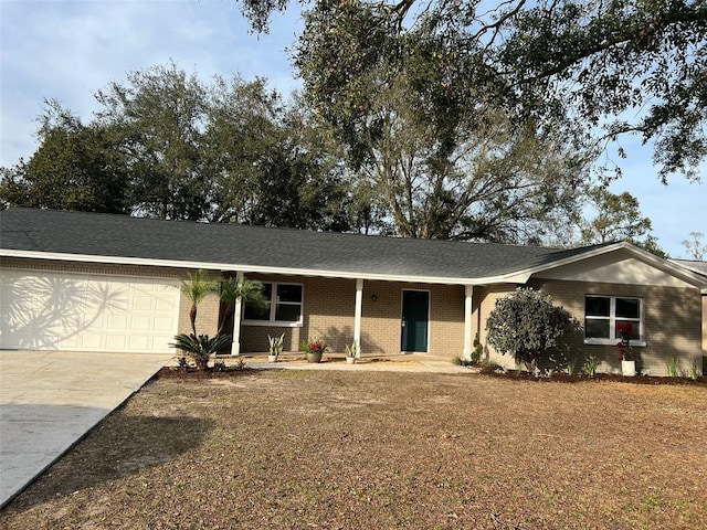 ranch-style house featuring a garage