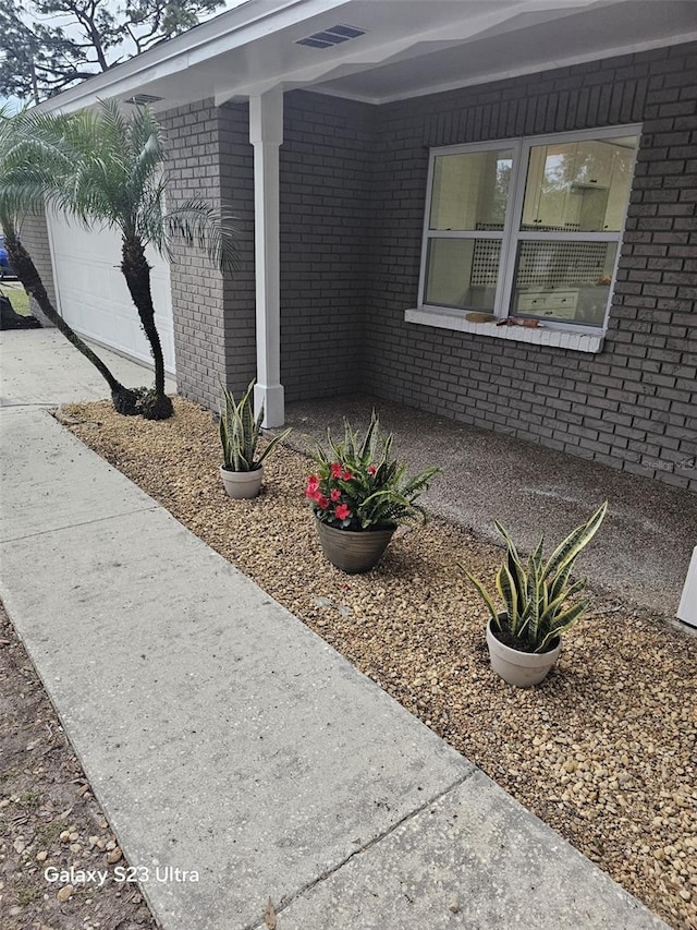 view of side of property featuring a garage