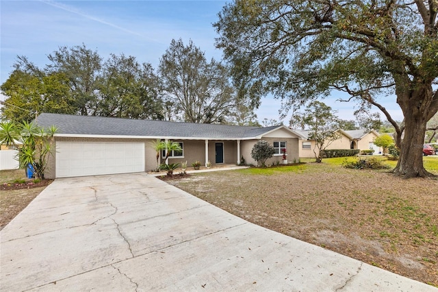 single story home featuring a garage