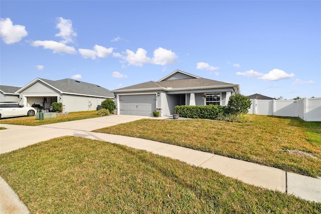 view of front facade featuring a garage and a front yard