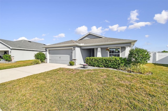 view of front facade featuring a garage and a front yard