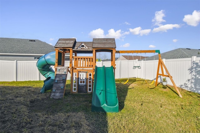 view of jungle gym with a lawn