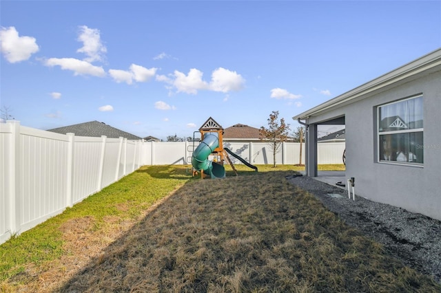 view of yard featuring a playground