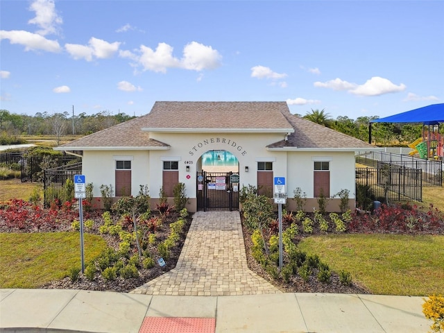 view of front of home with a front yard