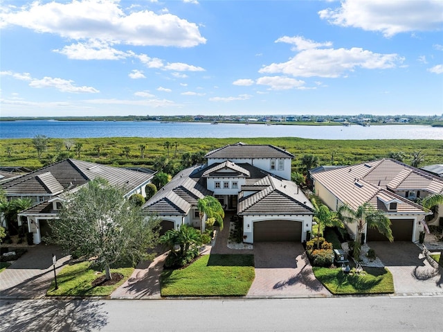 bird's eye view with a water view