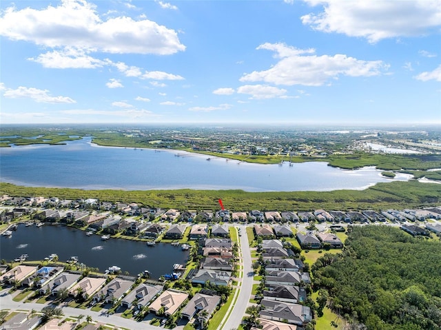 bird's eye view with a water view