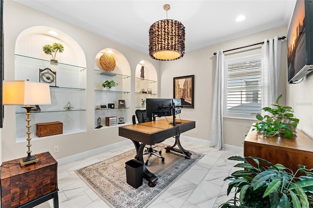 office area with ornamental molding and built in features