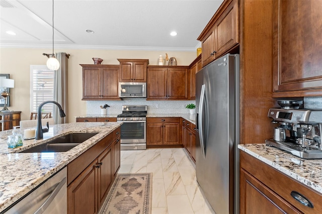 kitchen with stainless steel appliances, crown molding, sink, and light stone counters