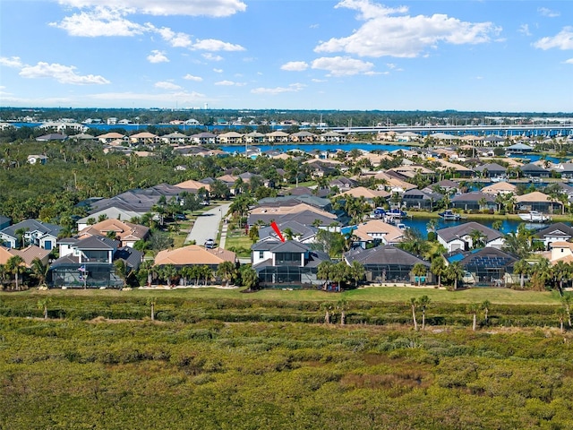 bird's eye view with a water view