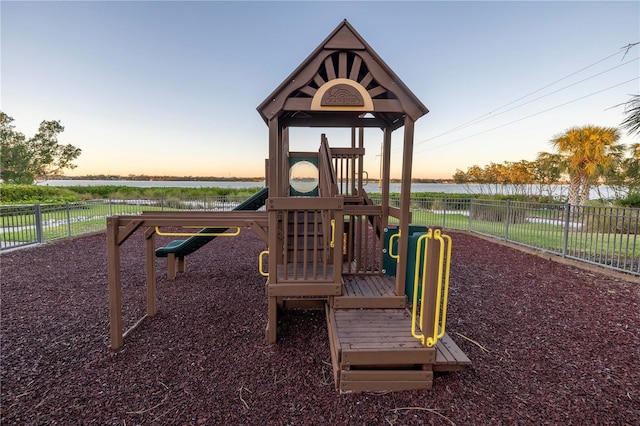 playground at dusk with a water view