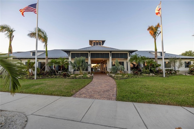 view of front of home with a front lawn