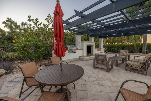 view of patio / terrace with area for grilling, grilling area, and a pergola