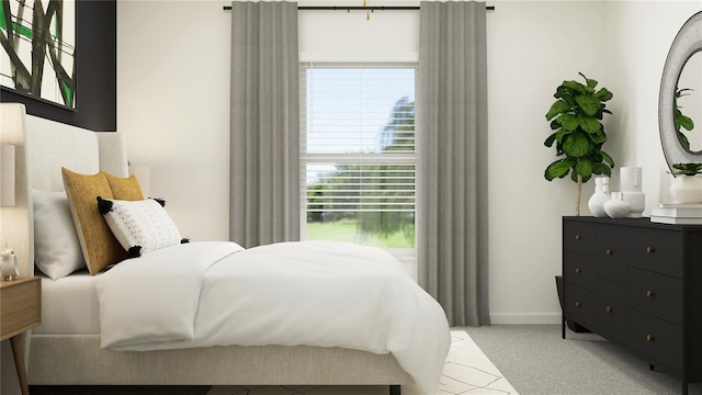 bedroom with light colored carpet