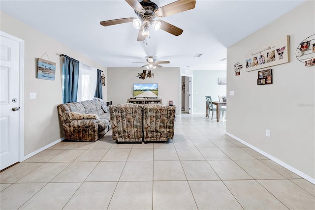 living room with light tile patterned flooring