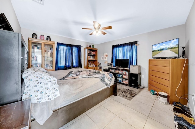 bedroom featuring tile patterned flooring and ceiling fan