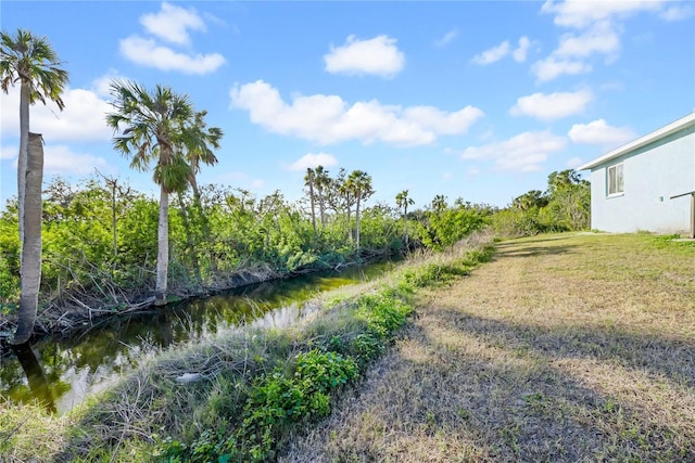 view of yard featuring a water view