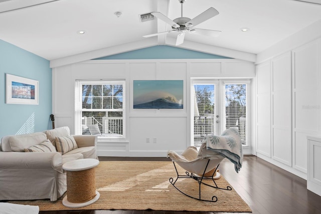 living room featuring vaulted ceiling with beams, hardwood / wood-style flooring, a wealth of natural light, and ceiling fan