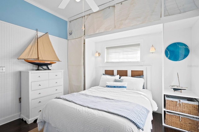 bedroom featuring dark hardwood / wood-style flooring and crown molding