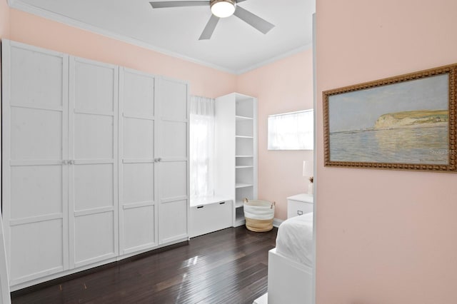 interior space with ceiling fan, ornamental molding, and hardwood / wood-style floors