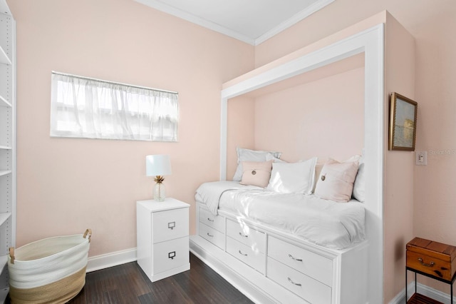 bedroom with dark hardwood / wood-style flooring and crown molding