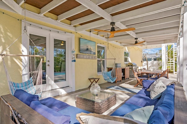 view of patio / terrace with ceiling fan and outdoor lounge area