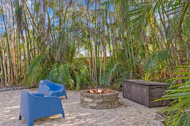 view of patio / terrace featuring an outdoor fire pit