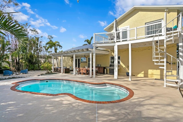 view of pool featuring a grill, a pergola, an outdoor hangout area, and a patio