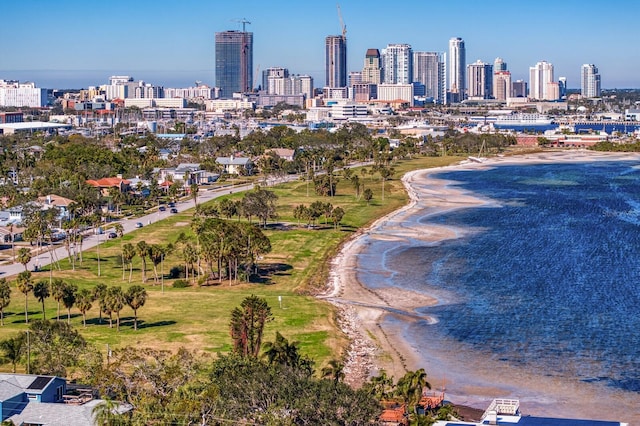 aerial view featuring a view of the beach and a water view