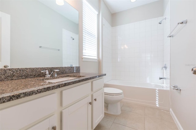 full bath with bathing tub / shower combination, vanity, toilet, and tile patterned floors