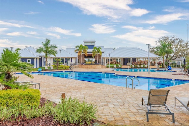 community pool featuring a patio