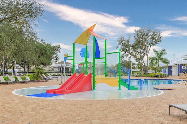 communal playground featuring fence